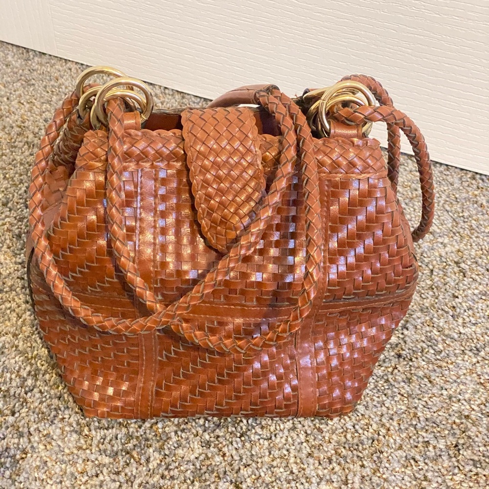 E collection cross body bag. Outside in great condition
